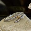 Pulsera rígida de acero y oro - Imagen 2